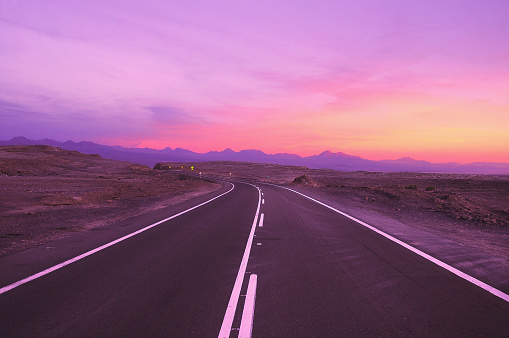 View of the highway at sunset time. Atacama Desert. Chile.