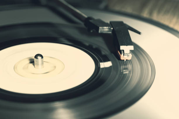 istock Music From a Vintage 45 RPM Record Playing on a Turntable 936678786
