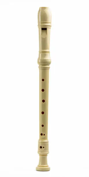 Soprano (Descant) recorder. Plastic recorder flute isolated on white background with copy space for text. Classical Baroque music instruments. Education on music class.
