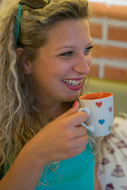 istock Beautiful curly girl in cafe 936685522