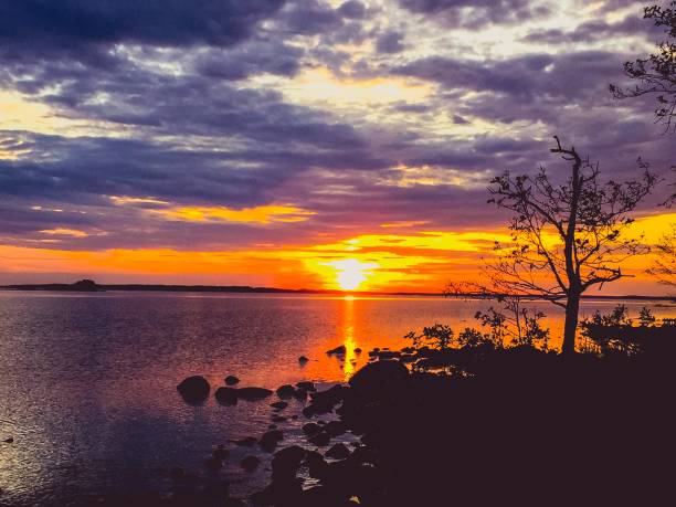 istock midnight sunset in finnish summer 936685758