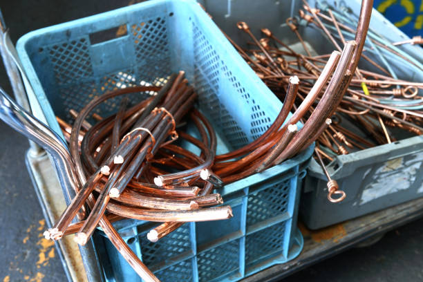 istock Metal recycling factory. Copper wire pulled out of the discarded cable. 936692986