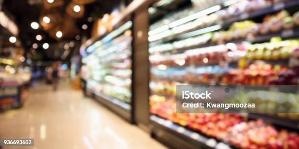 Abstract Blur Organic Fresh Fruits And Vegetable On Grocery Shelves In Supermarket Store Defocused Bokeh Light Background Stock Photo - Download Image Now