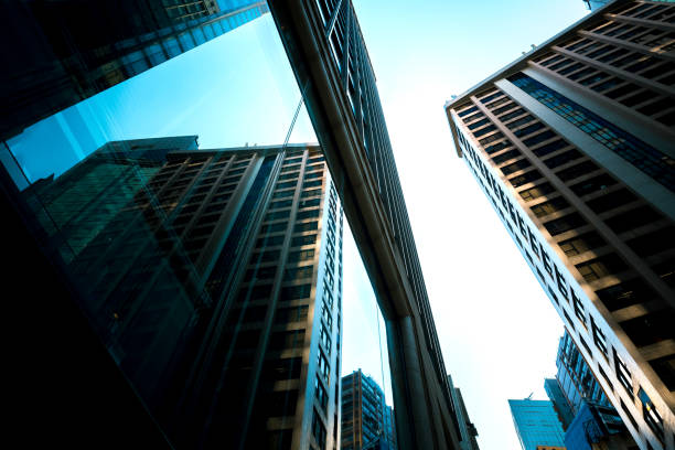 istock Bottom up view of Modern office building in Hong Kong 936697732