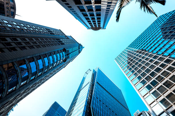 istock Bottom up view of Modern office building in Hong Kong 936697744
