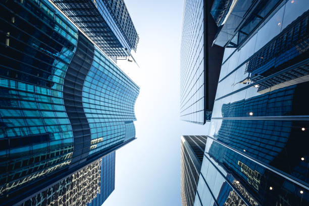 istock Bottom up view of Modern office building in Hong Kong 936697766