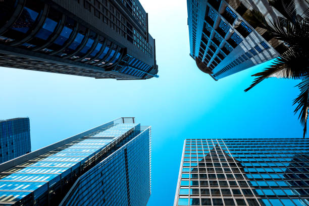 istock Bottom up view of Modern office building in Hong Kong 936697768
