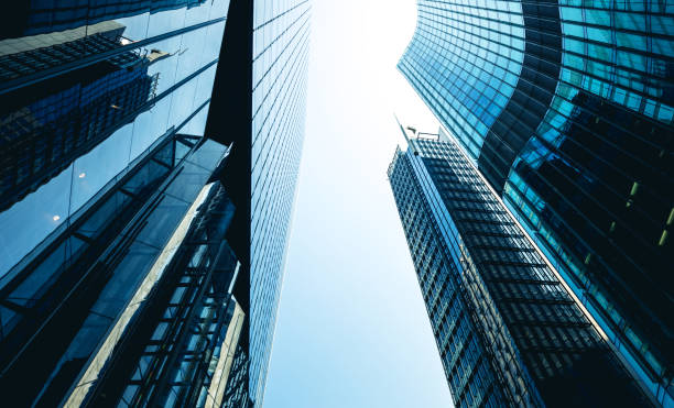 istock Bottom up view of Modern office building in Hong Kong 936697792