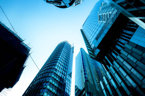 istock Bottom up view of Modern office building in Hong Kong 936697796