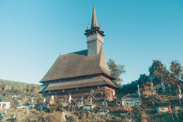 Image of wooden Biserica Sf. Nicolae in Maramures in Romania.