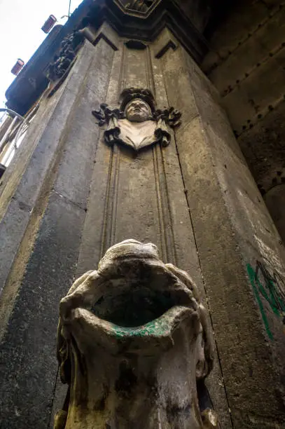 Palazzo Carafa della Spina, Naples with caratheristic taproot used to extinguish torches