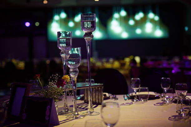 istock Large glass candlesticks in the banquet hall 936708180