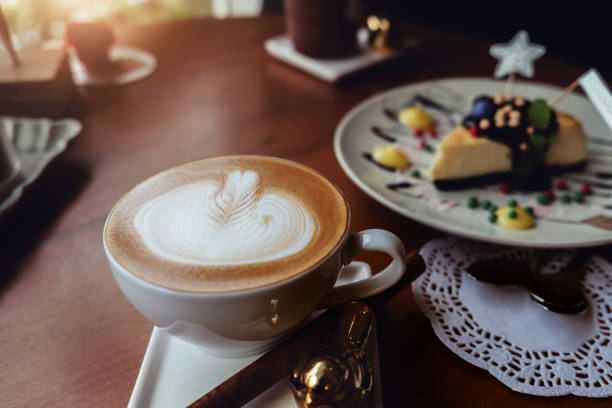 istock selective focus, latte art in coffee cup in cafe shop. 936718714