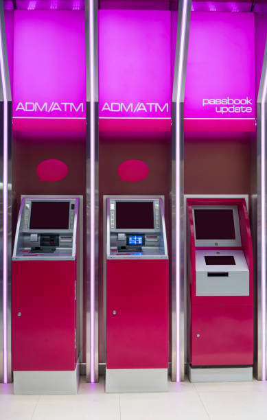 istock Pink ATM machines and passbook update machine. The station automatic machines. 936719020