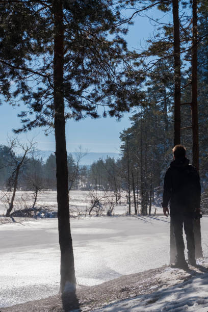 istock Watch frozen and lake 936729344