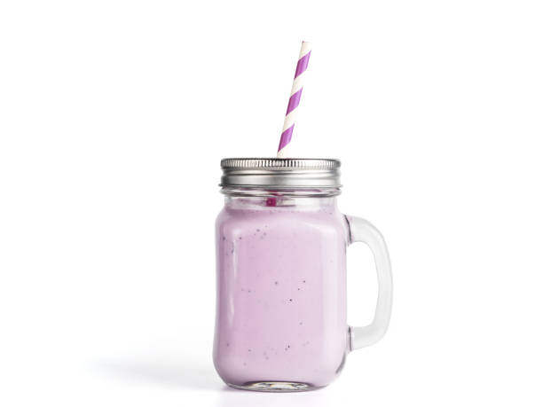 istock blueberry smoothie in mason jar glass isolated 936729500