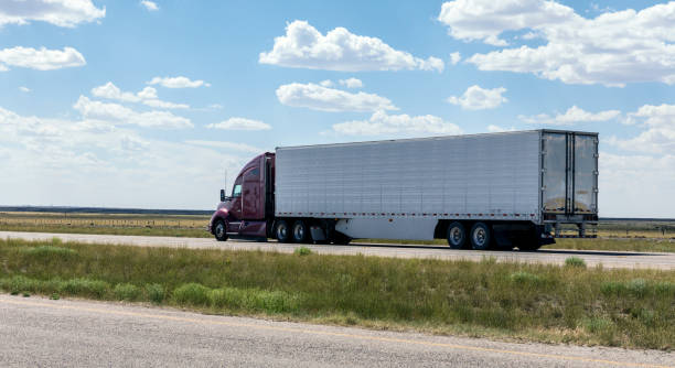 istock Semi Tractor Trailer Truck on Wyoming Interstate 80 Expressway 936739064