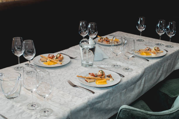 istock Table served for a wine tasting. Snacks with Pasta, Cheese, Vegetables. Spain tapas recipe food pintxos. Served dish for food and wine tasting 936742226