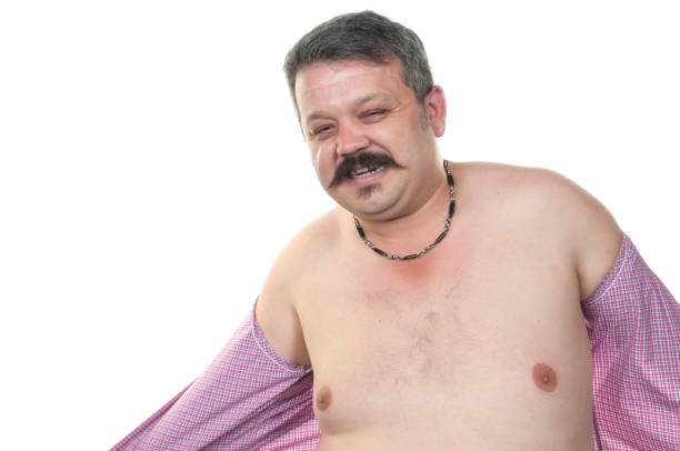 istock Overweight man trying to fasten too small clothes 936753642