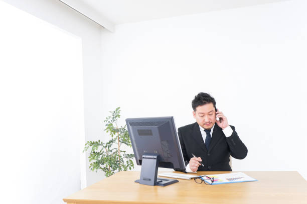 istock Businessman telephoning at office 936757124