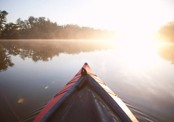 istock Paddling kayak sunrise light 936757332