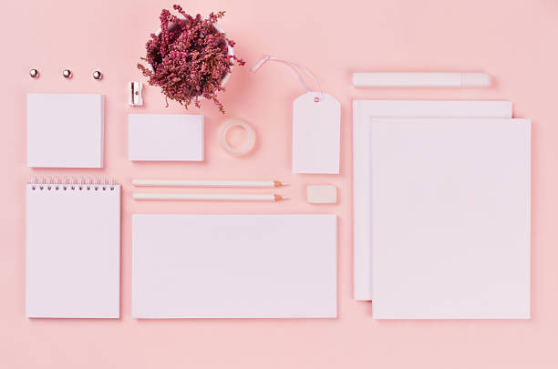 istock White branding stationery, mock up scene on light soft pastel pink background, blank objects for placing your design. 936769292