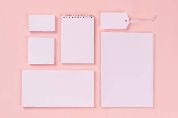 istock Blank white stationery collection on elegant soft pastel pink background. Corporate identity template. Mock up for branding, graphic designers presentations and portfolios. Top view. 936769296