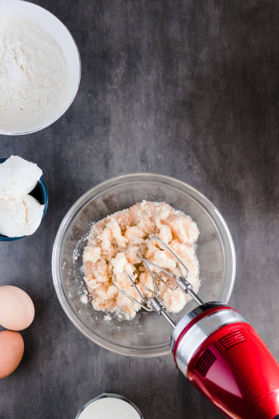 istock MIxing baking ingredients in a bowl on dark 936769800