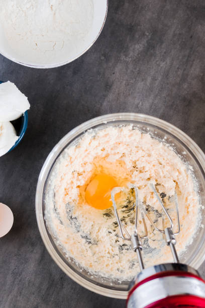 istock MIxing baking ingredients in a bowl on dark 936769830
