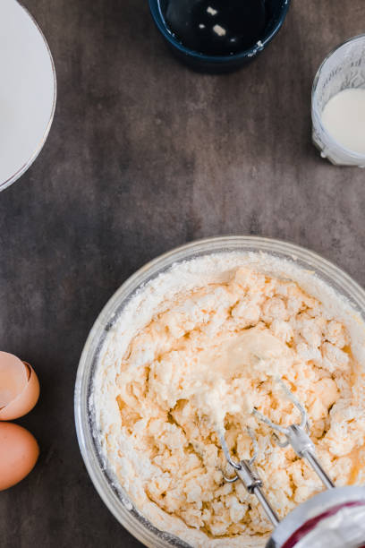 istock MIxing baking ingredients in a bowl on dark 936769850