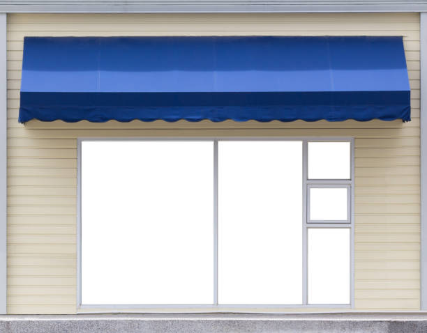 blue awning over glass window of the office