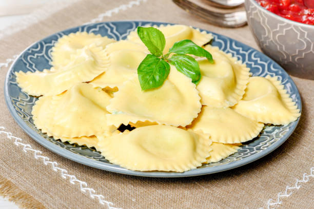 istock plate of delicious fresh ravioli on the table 936776846