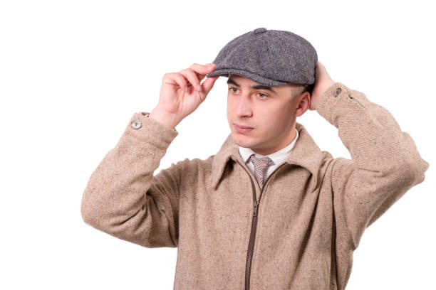 istock young man in vintage clothes with a hat, 1940 style 936776976