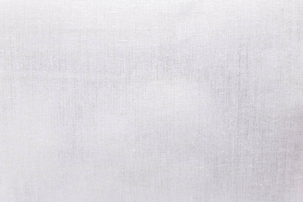 White ecology fabric texture background. Blank canvas textile material or calico cloth.