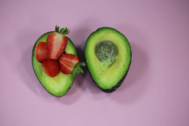 istock Avocado halved, filled with strawberries 936782562