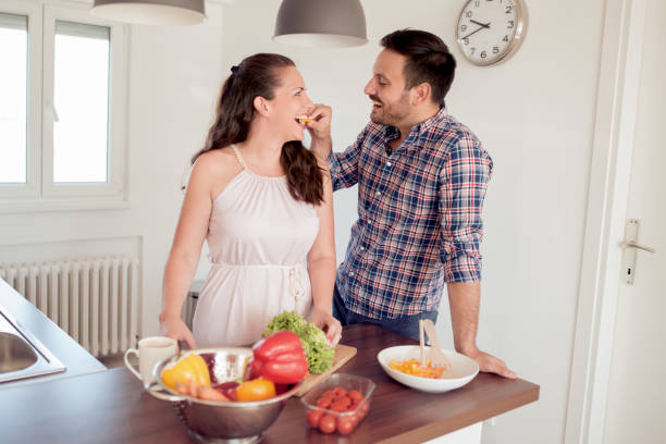 istock Beautiful couple spending time at home in summer morning 936790716