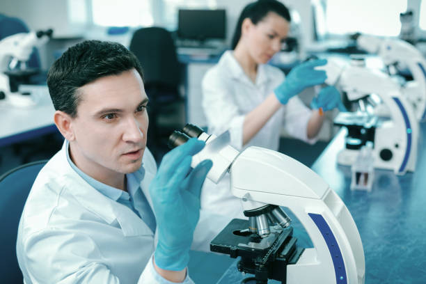 istock Attentive male person checking reagent 936792956