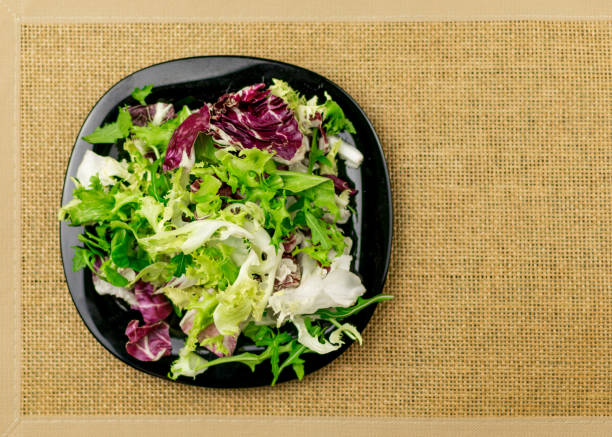 istock Vegetarian salad of fresh vegetables on a plate. 936793542