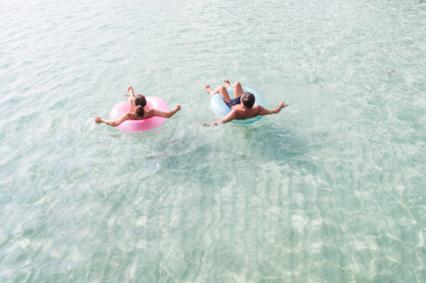 istock Senior couple enjoy sea water 936794090