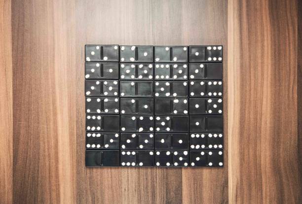 istock Game of domino on wood background. 936796710