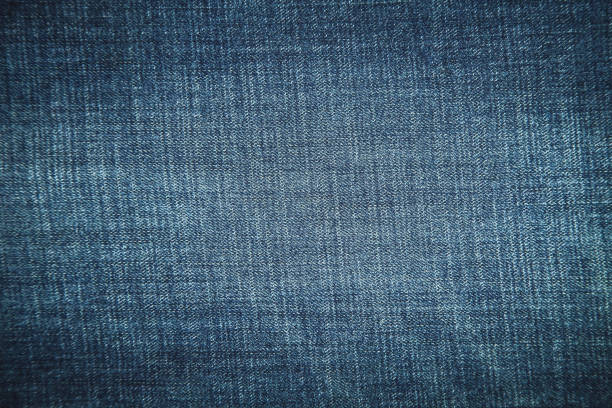 istock Texture of blue jeans background. 936798848