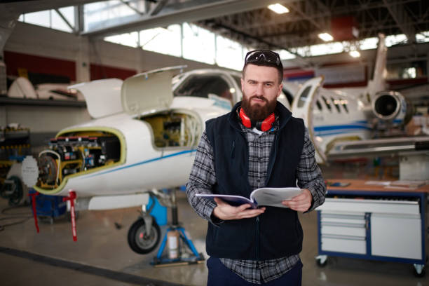 istock Aircraft mechanic in the hangar 936804342