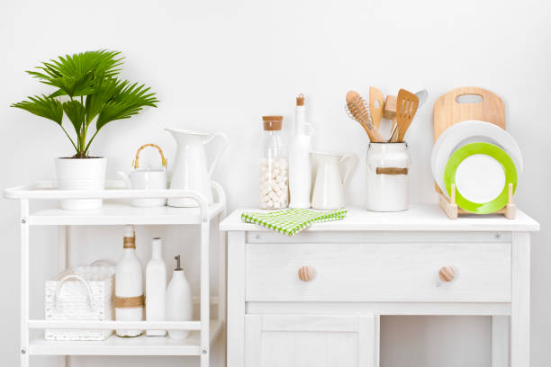istock Various kitchen utensils and tools with elegant vintage white furniture 936804732