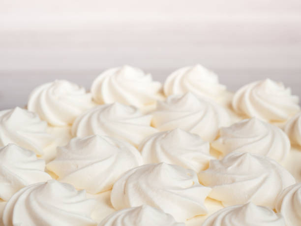 istock Delicious light ice cream cake with roses cream Background 936808268
