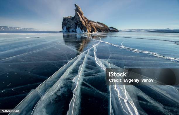 Lake Baikal Is A Frosty Winter Day Largest Fresh Water Lake Lake Baikal Is Covered With Ice And Snow Strong Cold And Frost Thick Clear Blue Ice Icicles Hang From The Rocks Amazing Place Heritage Stock Photo - Download Image Now