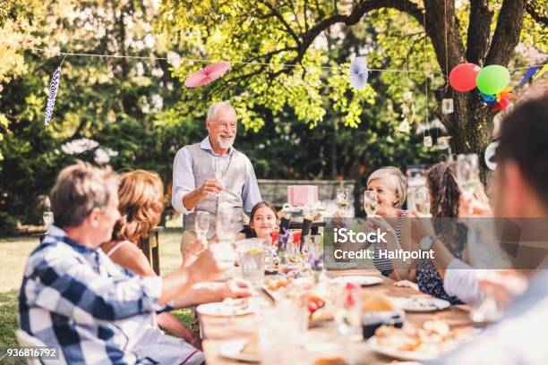 Family Celebration Or A Garden Party Outside In The Backyard Stock Photo - Download Image Now