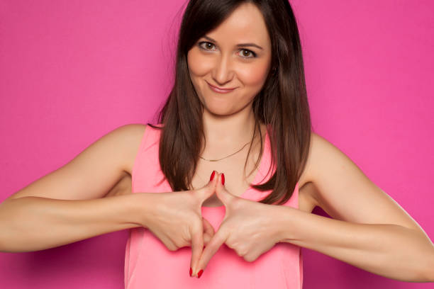 istock Young funny woman on pink background 936821868