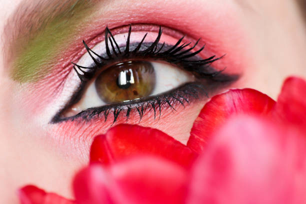 istock Women's makeup green brown eyes. 936829544