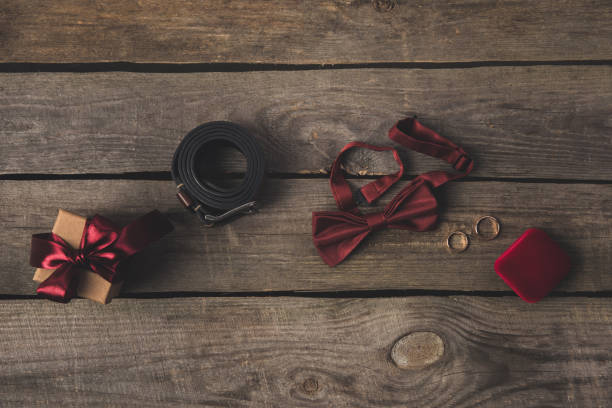istock flat lay with wedding accessories, gift and bridal bouquet on wooden surface 936834060