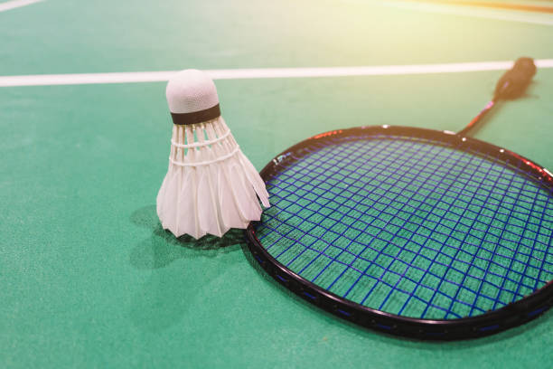 istock badminton shuttlecock in competing badminton  courts blur background 936835556